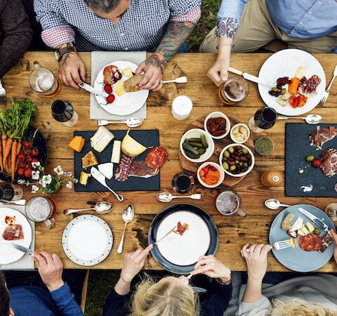 Above shot of a group eating dinner at a table