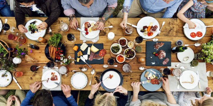 Above shot of a group eating dinner at a table