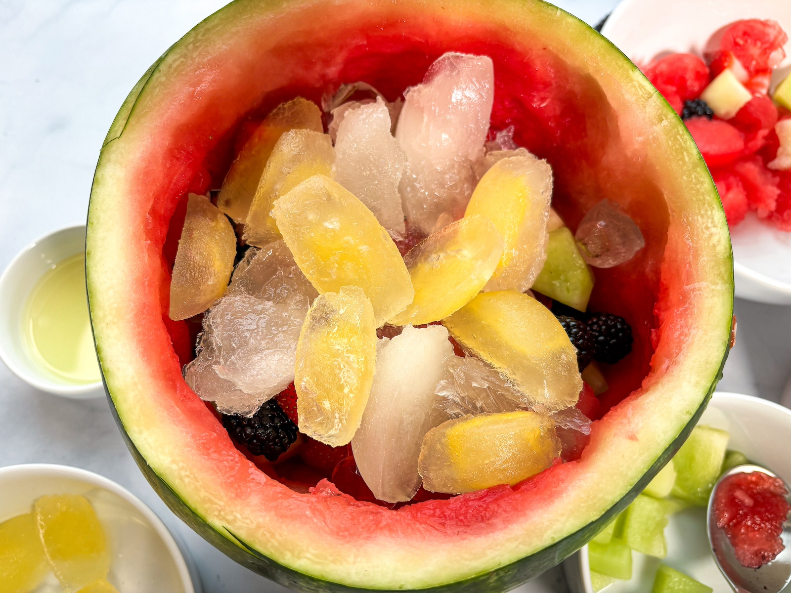 Pineapple_and_lychee_ice_in_watermelon_bowl