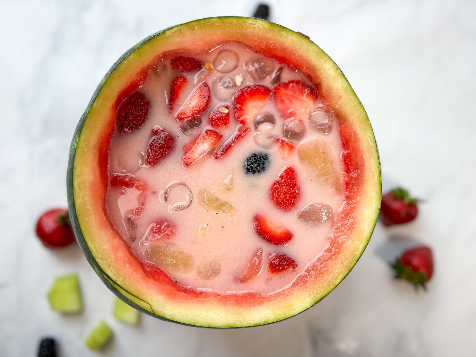 Subak-Hwachae in a watermelon punch bowl birds eye view.