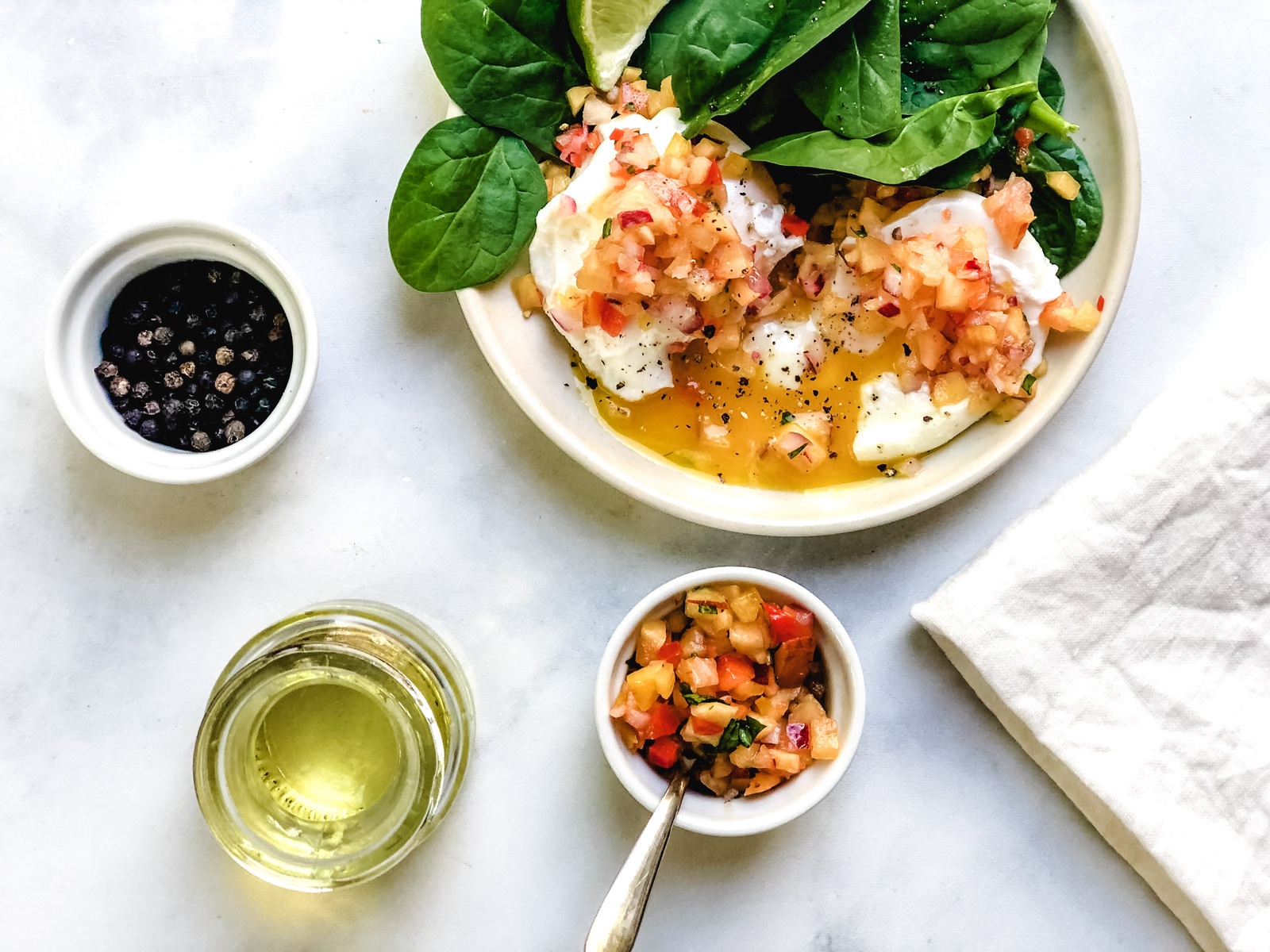 Poached eggs with peach salsa for breakfast. 