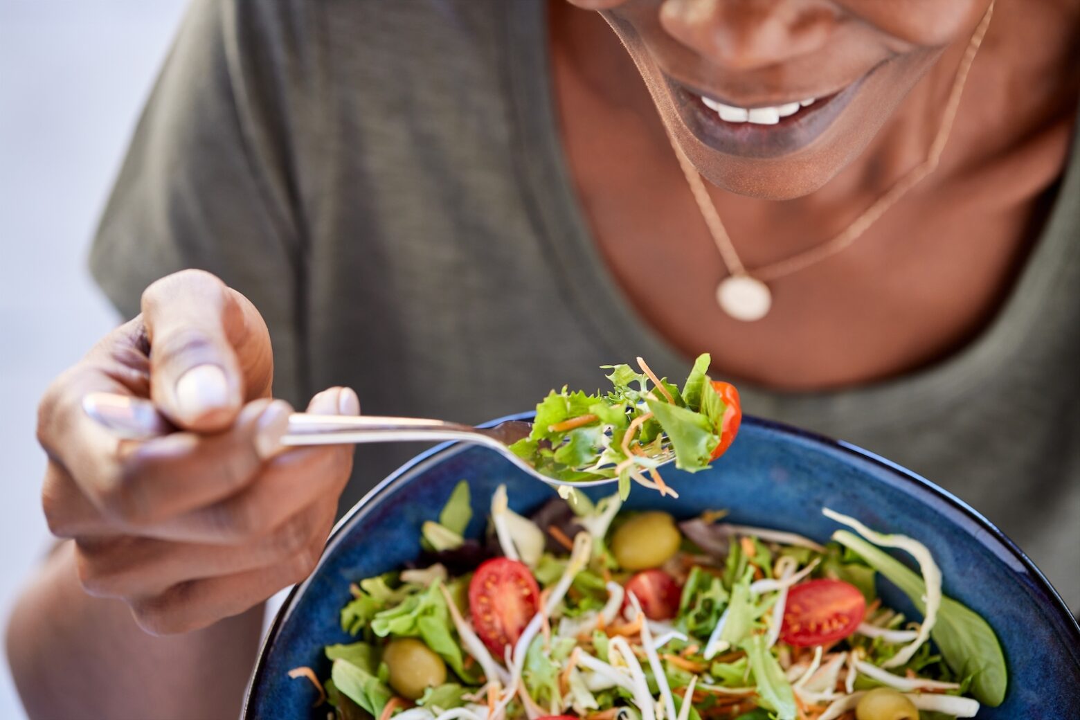 women eating a salad